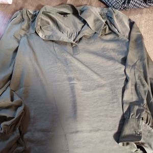 Light green top brand new with tags . Just to big